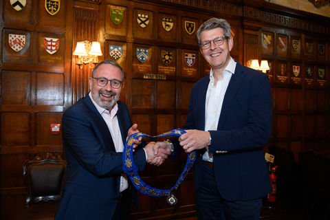 Outgoing President Mario Del-Signore hands over the presidency to Kaz Spiewakowski.