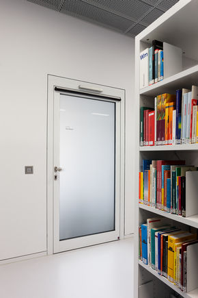 Swing door drive - Slimdrive EMD-F, City Library at the Mailänder Platz An electromechanical swing door drive for single leaf fire and smoke protection doors