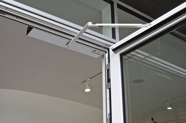 Electromechanical swing door drive - Slimdrive EMD, Vitra House Equipped with automatic reversing, detects an obstacle and returns to the opening position. It is also equipped with the Push & Go function.