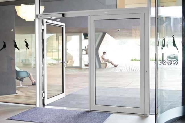 Swing door drive - Slimdrive EMD, Vitra House An electromechanical swing door drive that even moves doors up to 230 kg with ease, allowing visitors convenient ease of access.