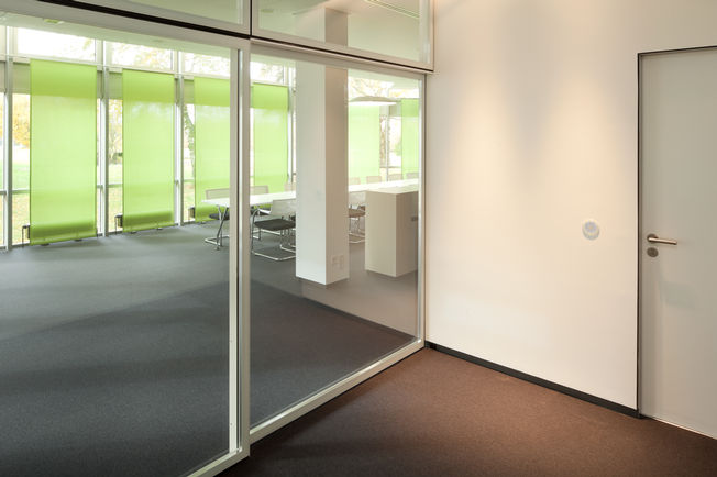 Slimdrive SL NT + IGG NT + LED, GEZE GmbH Leonberg Very smooth low-wear automatic linear sliding door system with low height and clear design line.