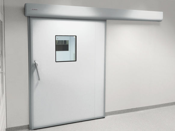 Drive solution GEZE Powerdrive PL-HT kit in a hospital Automatic linear sliding door system for large heavy doors in areas with increased hygiene demands