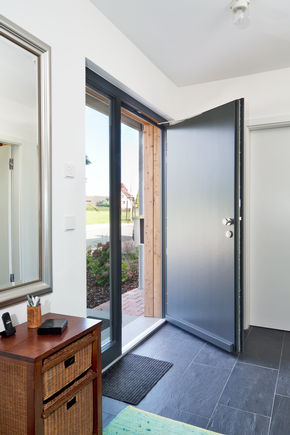 Swing door drive ECturn Inside Integrated electromechanical swing door drive for barrier-free single leaf doors up to 125 kg, installed in a private residence