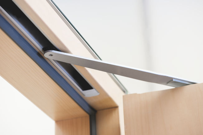Integrated overhead door closers are invisible when the door is closed - and therefore an elegant solution for modern architecture, where covered sliding fitting systems are preferred.
