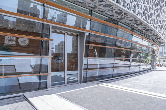 One of the many entrance façades featuring Powerturn swing door systems.