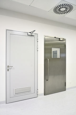 Hygienic Doors at Children's Memorial Health Institute Doors in the corridor of the Children's memorial health institute in Warsaw, Poland, with TS 3000 V and TS 2000 V BC at swing doors. Hygienic doors, doorway, window and safety technology for health care, for hospitals.
