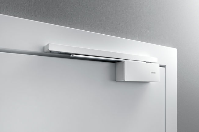 GEZE ActiveStop surface-mounted on a timber door Gentle stopping, quiet closing and comfortable holding open of doors Practically eliminates issues like slamming doors, trapped fingers and damage to walls or furniture.