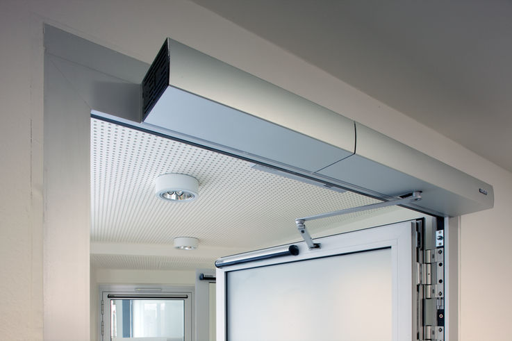 GEZE Slimdrive swing door drive with integrated hold-open device