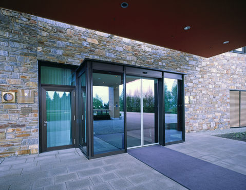 Glazed automatic door in the hotel entrance.