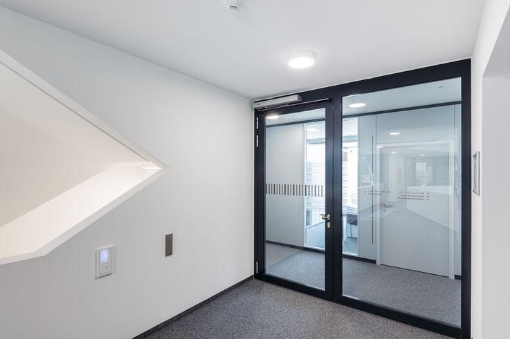 Fire protection doors secure openings in fire sections.