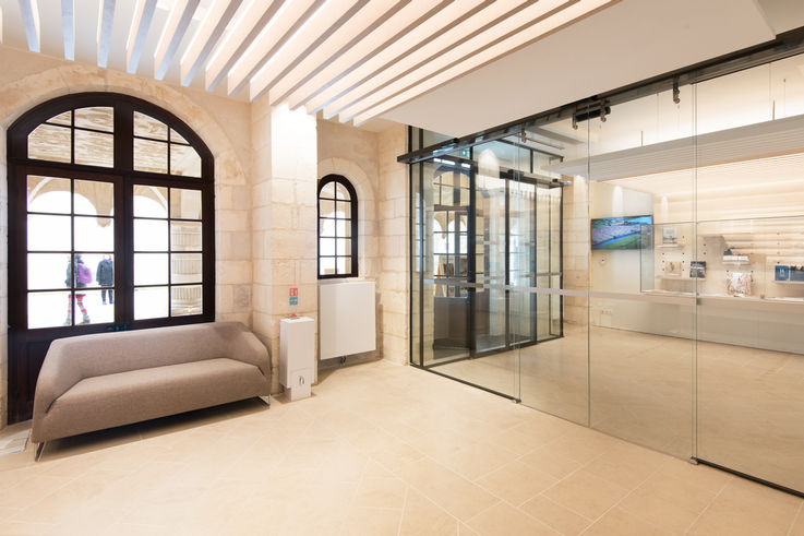 Public areas with all-glass automatic sliding doors.