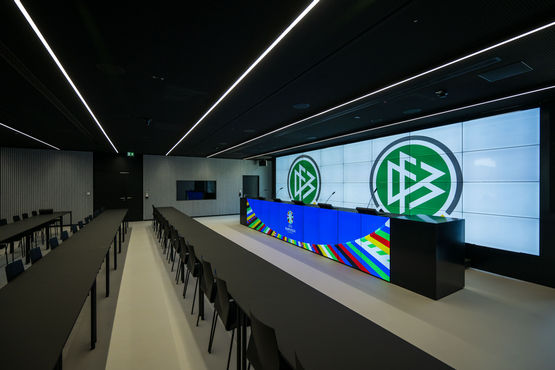 View of the press conference area in the DFB headquarters with emergency exit in the background.