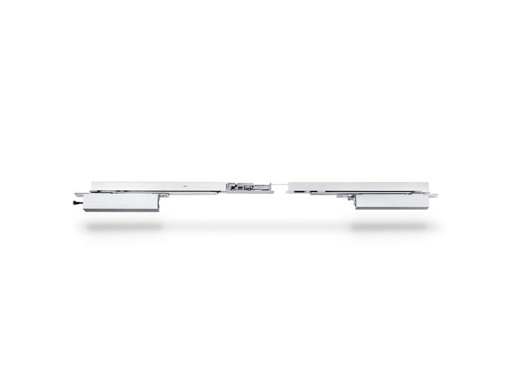 Product shot (44321) - Integrated door closer system for double leaf doors with closing sequence control, electric hold-open device and integrated back check that slows down strongly opened doors.