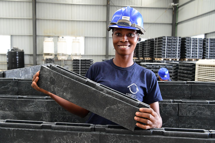  - Yvonne Koffi, a 22 year old girl, at the factory of Conceptos Plasticos, in Yopougon, a suburban of Abidjan, in the south of Côte d'Ivoire. The young girl is working now for two months at the factory. Yvonne says: “I’m very happy to be part of a team of woman who make bricks from recycled plastic waste. It’s amazing that plastic waste becomes a school for children. It makes my happy. “ UNICEF Côte d’Ivoire has partnered with Columbian social business Conceptos Plasticos to turn plastic waste into construction materials for new schools. Research suggests that over the next 30 years, the world may produce four times more plastic than we ever have before. Finding innovative uses for plastic will become imperative to public health. Without plastic waste management, groundwater pollution may leave many communities without access to clean water. Plastic-clogged drains could continue to cause flooding and damage infrastructure. And air pollution from burning trash will pose major environmental and health risks. Because of their cost-effectiveness, durability, and ease-of-assembly, bricks made from 100% plastic waste have the potential to disrupt the conventional construction model and catalyze a market for recycled plastic worldwide. Millions of waste pickers working informally in landfills and on city streets around the world could become key waste management partners – elevated out of poverty as they help clean our planet, and provide building blocks for the futures of our children.
