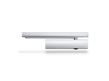 Overhead door closer with guide rail for barrier-free single leaf doors up to 1250 mm leaf width with opening assistance, and integrated back check, which decelerates quickly opened doors.