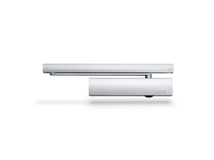 Product shot (49666) - Overhead door closer with guide rail for barrier-free single leaf doors up to 1250 mm leaf width with opening assistance, and integrated back check, which decelerates quickly opened doors.